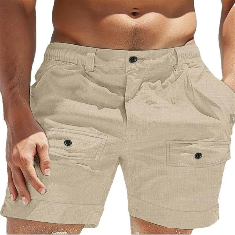Men's khaki linen shorts with an elastic waistband and button pockets laid flat