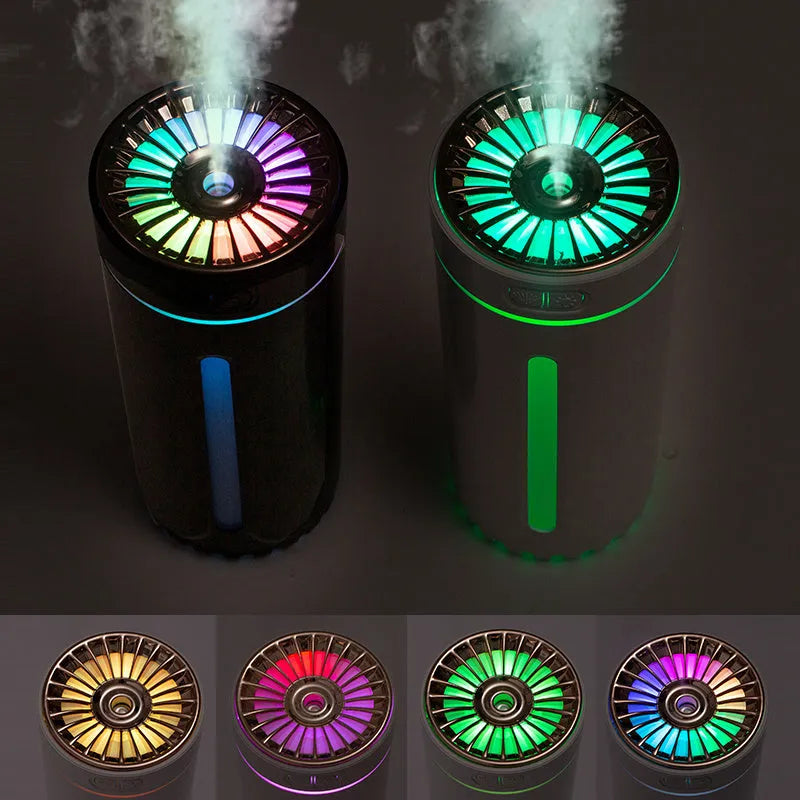 Black and white portable USB rechargeable humidifier with colourful lights for car and desktop use.