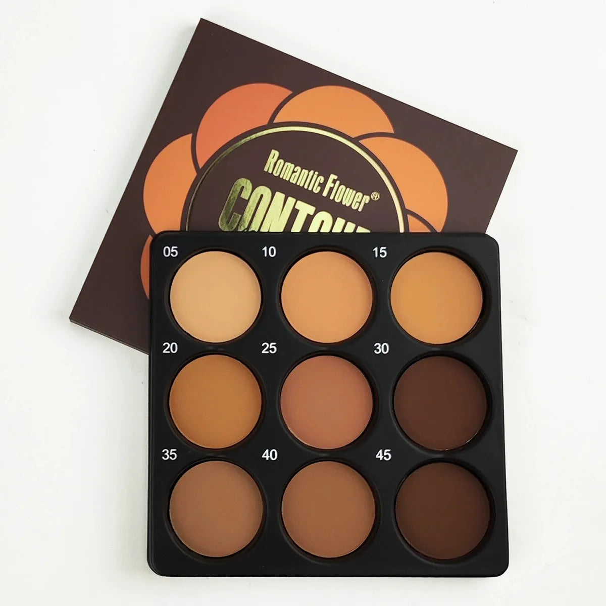 Makeup palette with nine dark matte eyeshadows and a repair disk.
