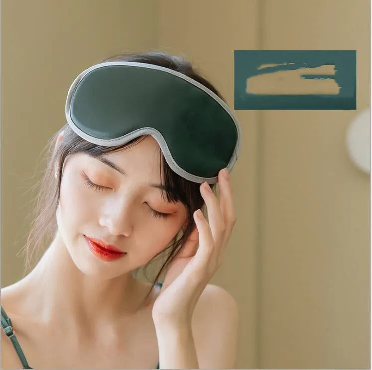 Green portable eye spa massage goggles showing suede shell and soft super fibre interior.