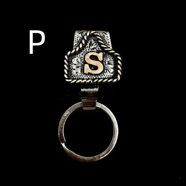 Handmade metal cow tag belt keychain in a selected colour from the A-Z letter range.