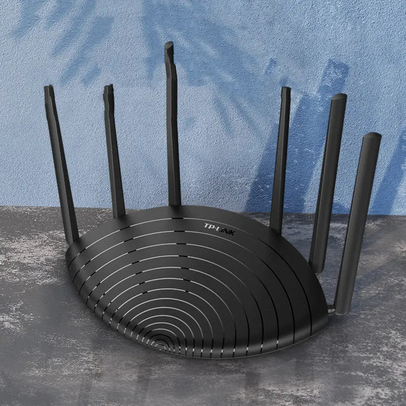 TP-Link TL-WDR7661 AC1900 Gigabit Edition wireless home router with compact black design.