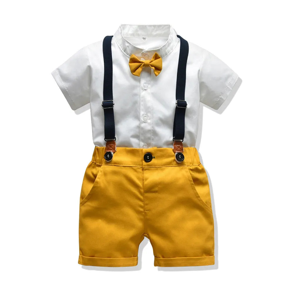Boy wearing a cotton trouser suit in blue with matching jacket and trousers, front view