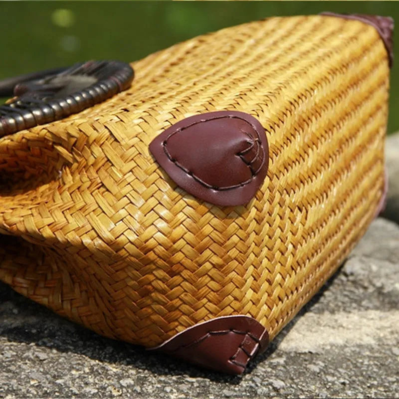 Handwoven rattan straw bag for women with wooden handle, cotton lining, and zipper closure in khaki colour