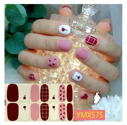 Full nail stickers set of 14 sheets showing 16 colour options in a flat lay arrangement