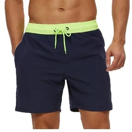 Men's blue running shorts with a stitching waistband, drawstring, and a side zippered pocket.