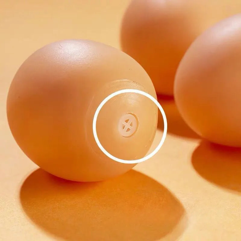 Chicken-flavoured simulation egg dog toy with textured surface for dental cleaning