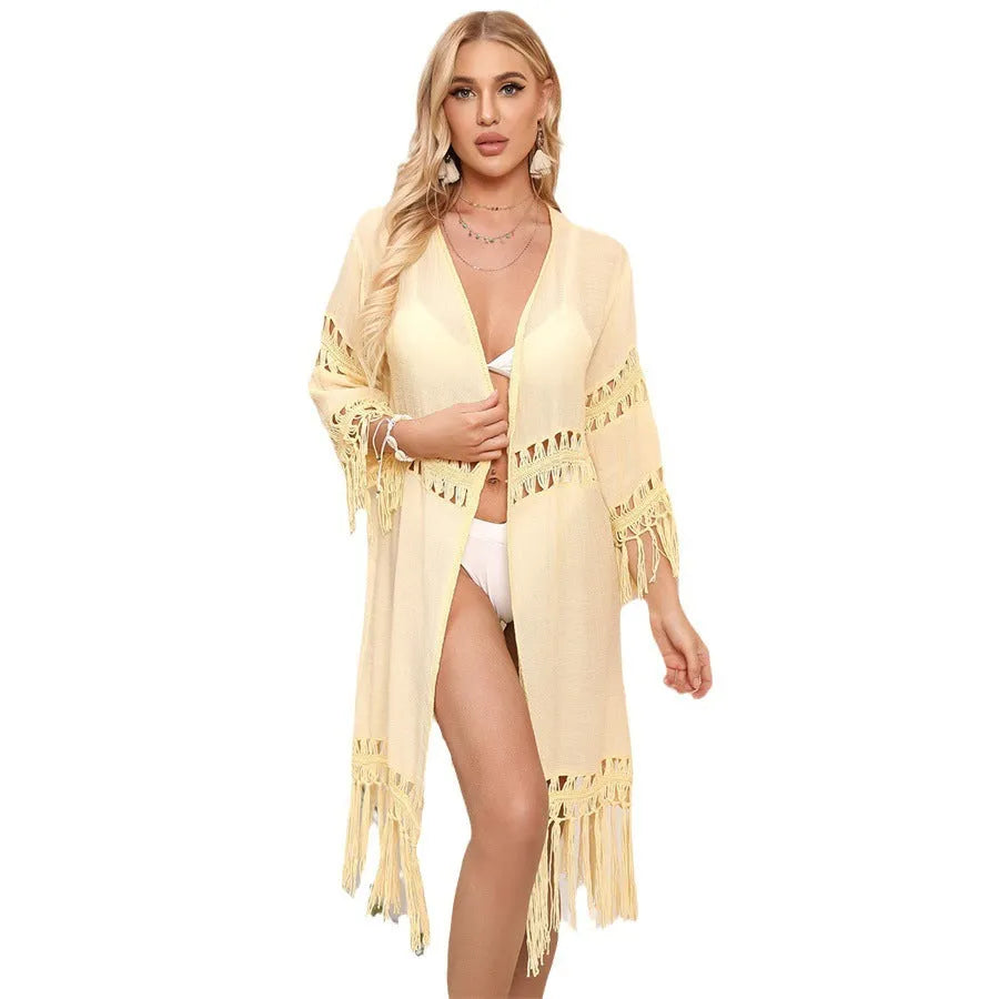Women's yellow crochet cardigan beach cover-up with tassel stitching detail