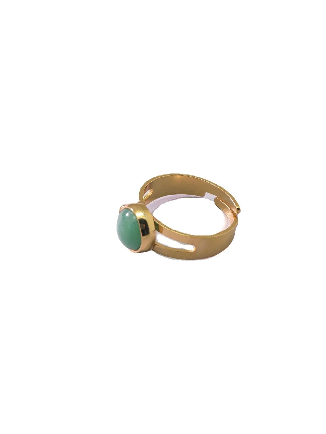 Copper adjustable ring with green natural stone inlay and gold-toned plating on white background