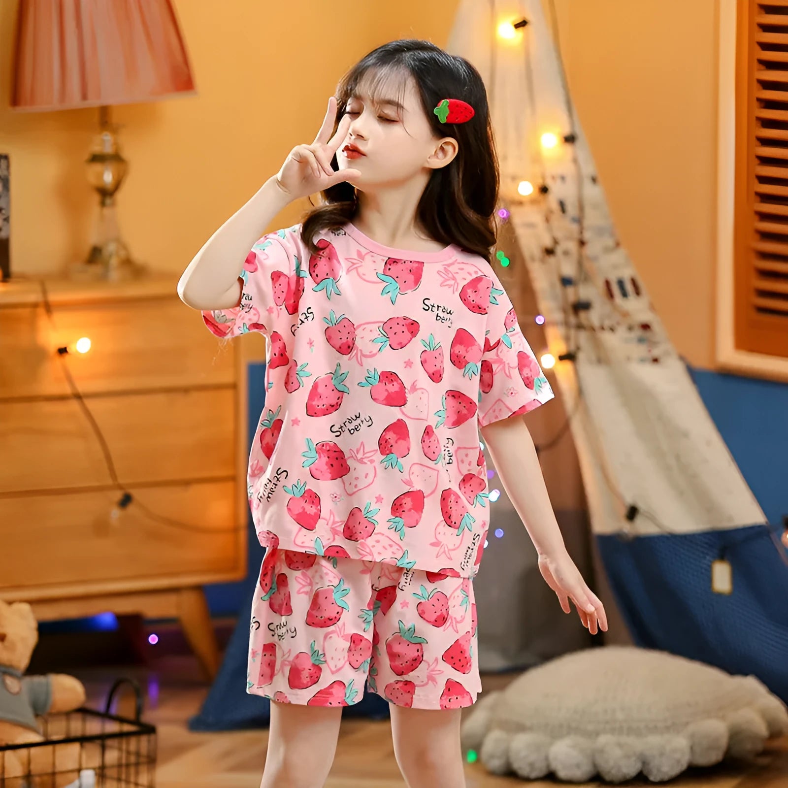 Children's cotton short-sleeved homewear set with cartoon print, top and pants, on a white background