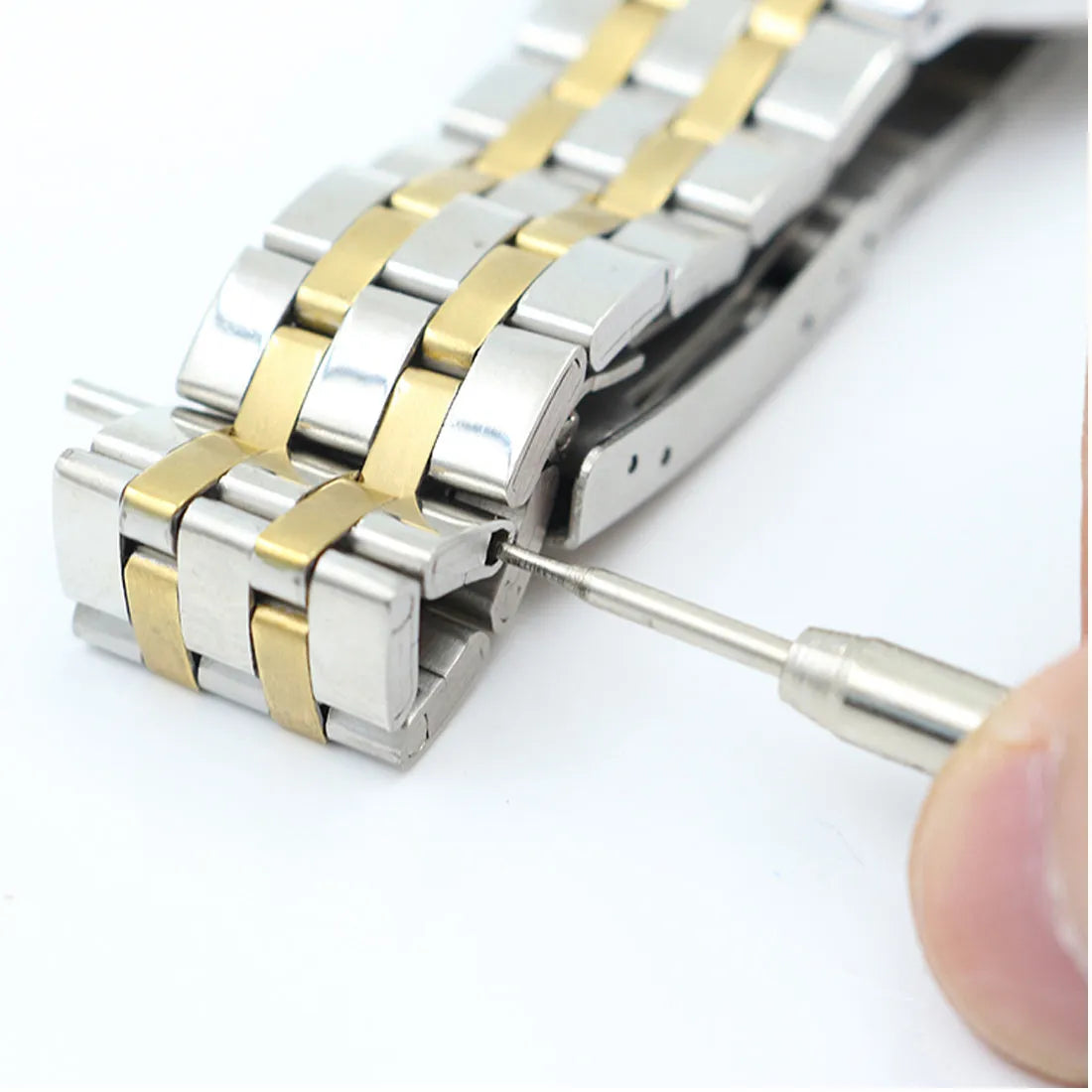 Stainless steel spring bar remover tool with V-edged and push-pin tips, 8.5cm length, on a grey background
