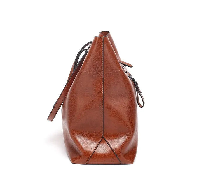 Horizontal waxed cowhide leather crossbody handbag for women showing internal compartments.