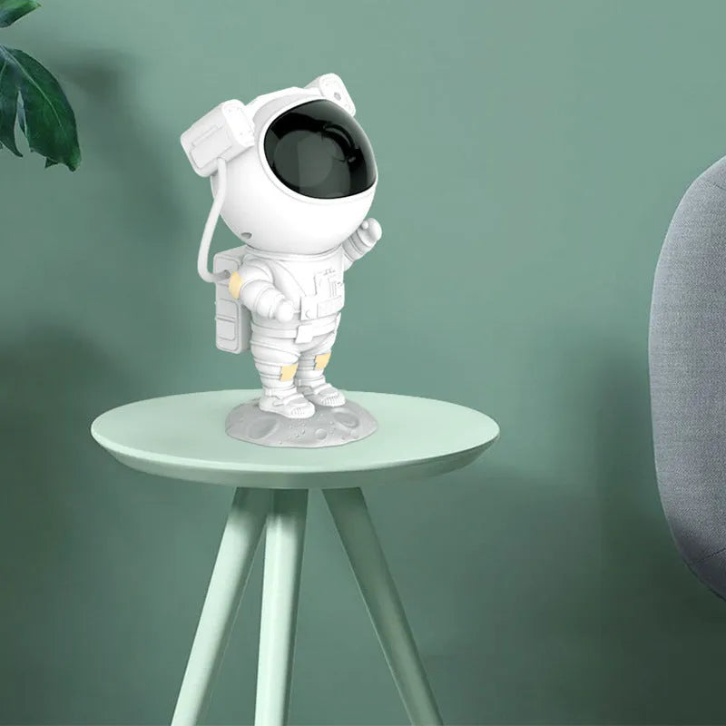 Creative astronaut galaxy starry sky projector nightlight on table with remote control, black finish