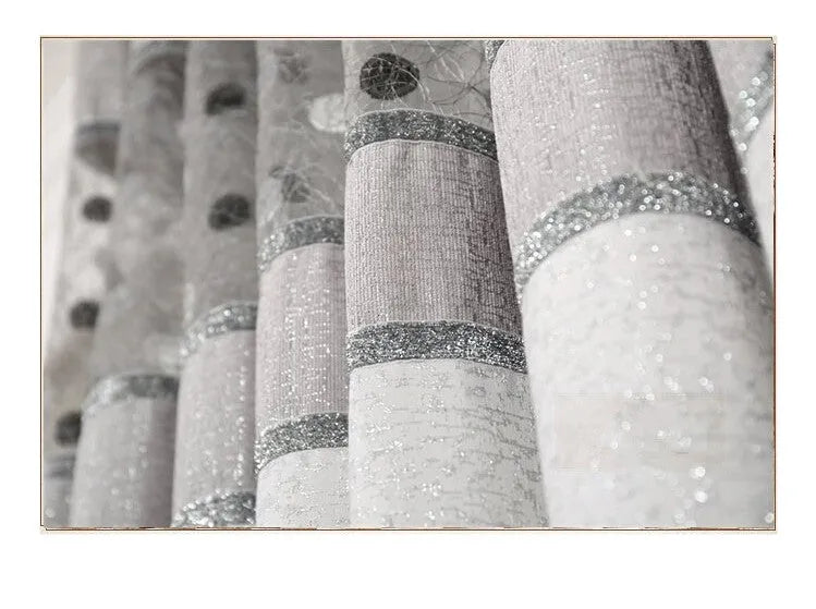 A single blackout curtain panel hung on a track, demonstrating its light-blocking fabric and hook-style header.