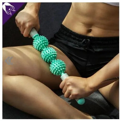 Anti-cellulite massager stick with hedgehog-shaped trigger point balls and ergonomic handle