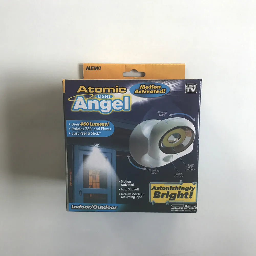 White Atomic Angel induction light with ABS plastic housing measuring 13.3cm wide