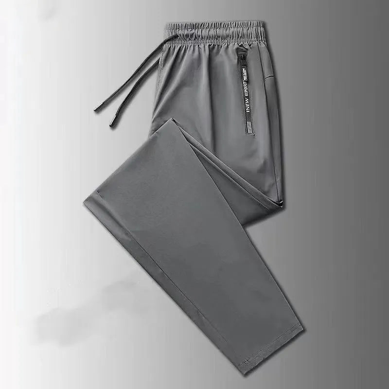 Men's loose fit thin ice silk polyester trousers in black leg style for autumn casual wear