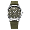 Men's silver case Army Green dial automatic watch with brown leather strap on wrist