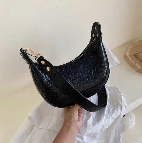 Retro crossbody bag for women in PU leather with 24cm top width, black colour, compact design