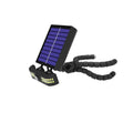 Octopus solar lamp with 40 LED beads, ABS shell, warm white light, placed on garden table