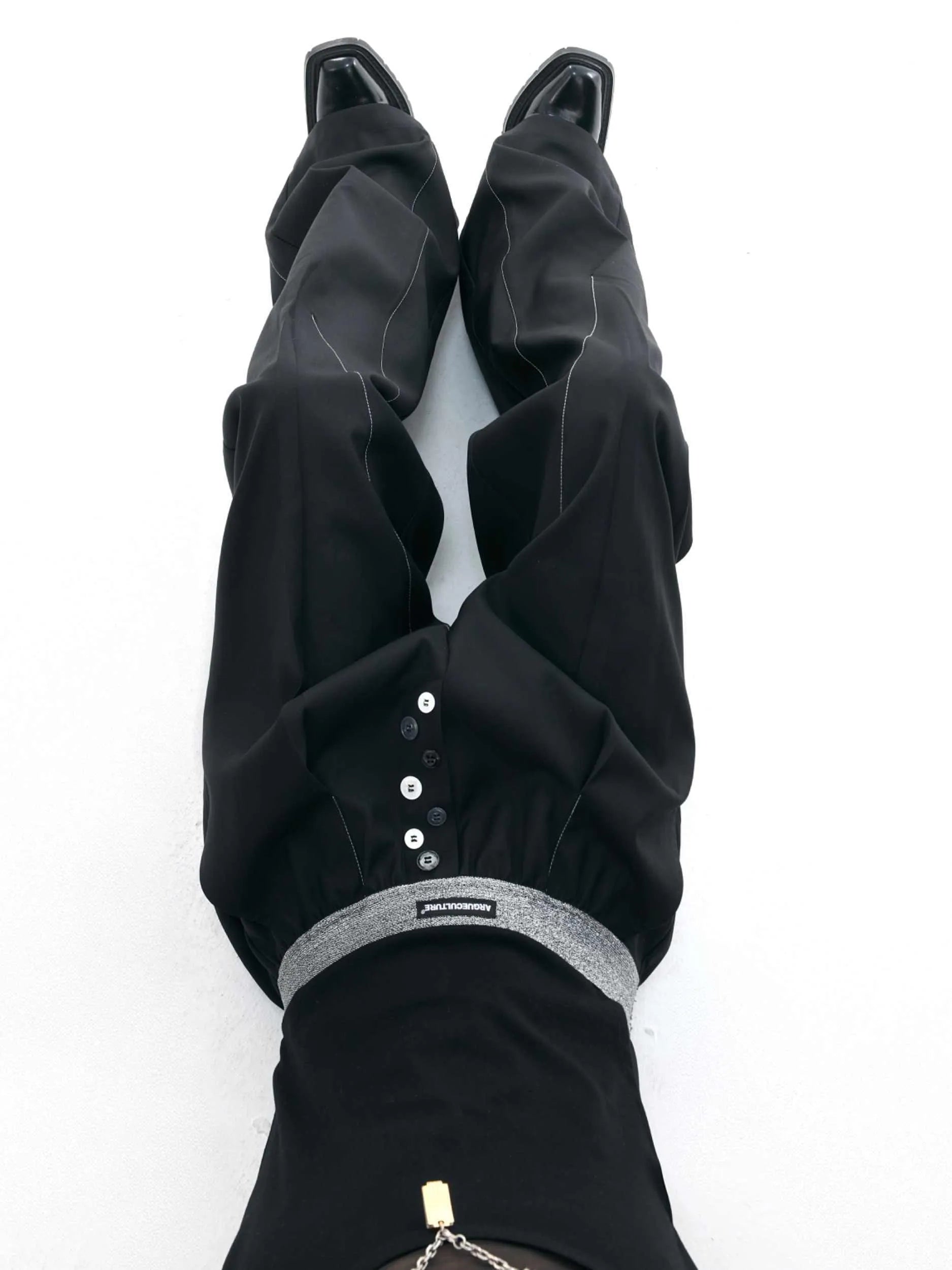 Drooping straight suit pants with button open line design and high waist in black colour