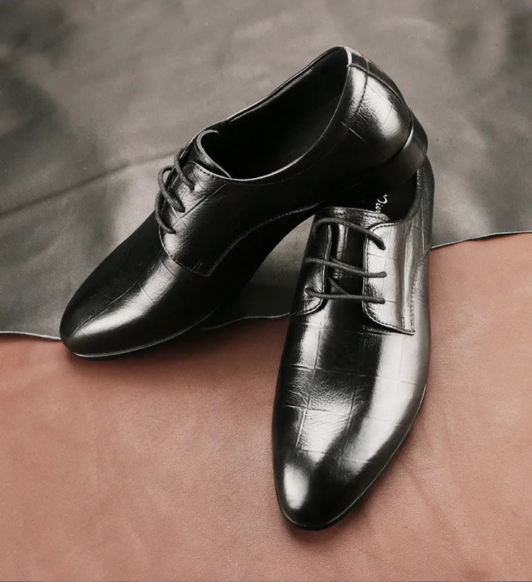 Men's black checkered leather derby shoes with pointed toe and rubber sole
