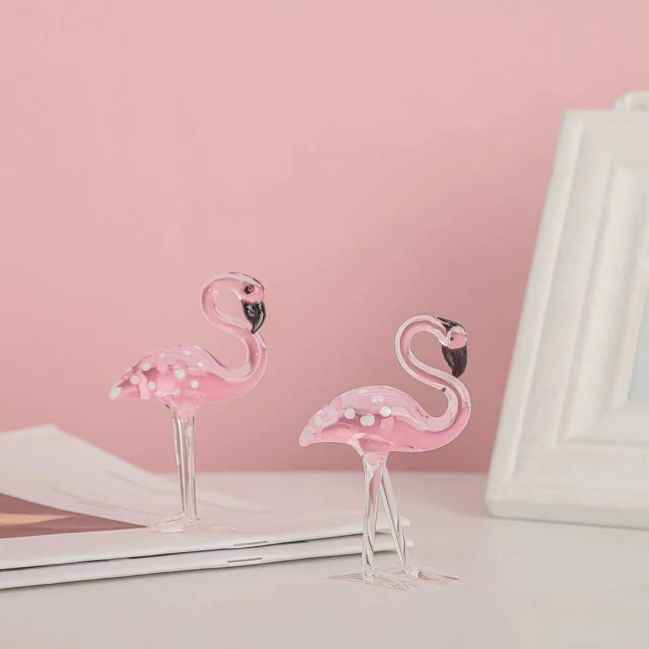 Pink crystal flamingo decorative figurine on table with modern simple style