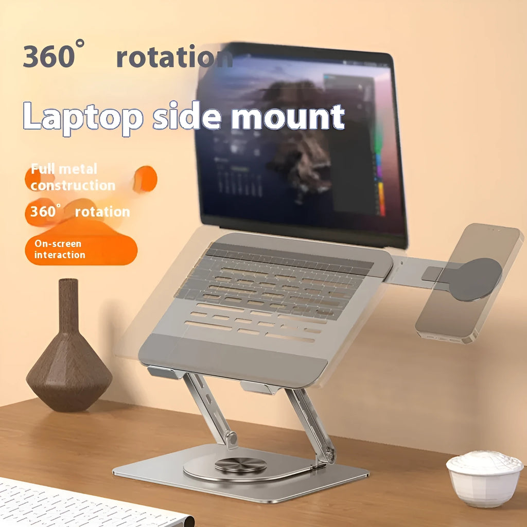 Silver carbon steel laptop stand with rotating base and integrated magnetic side phone holder.