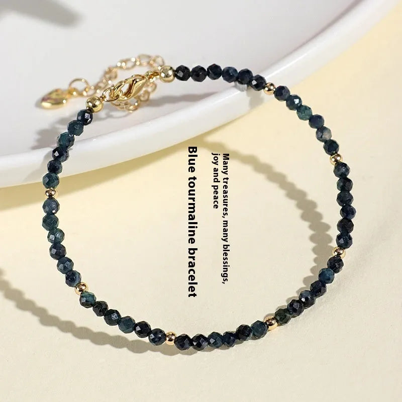 Blue tourmaline beaded bracelet with 3mm stones and silver spacer beads