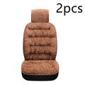 Universal winter warm plush car seat cushion set in beige, showing front seat cover with elastic fixings on a car interior