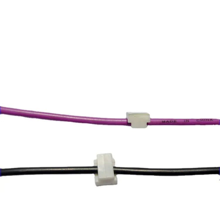 Black PA66 plastic automotive wire retaining clips for cable management in cars.