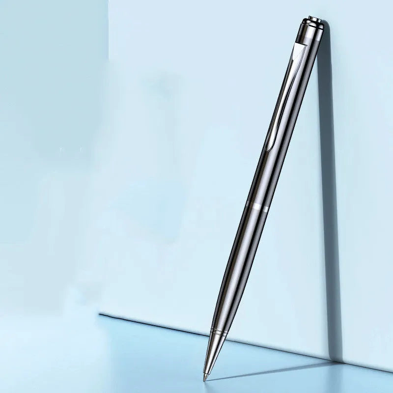 Black pen-shaped digital voice recorder with zinc alloy shell, shown next to included headset and data cable