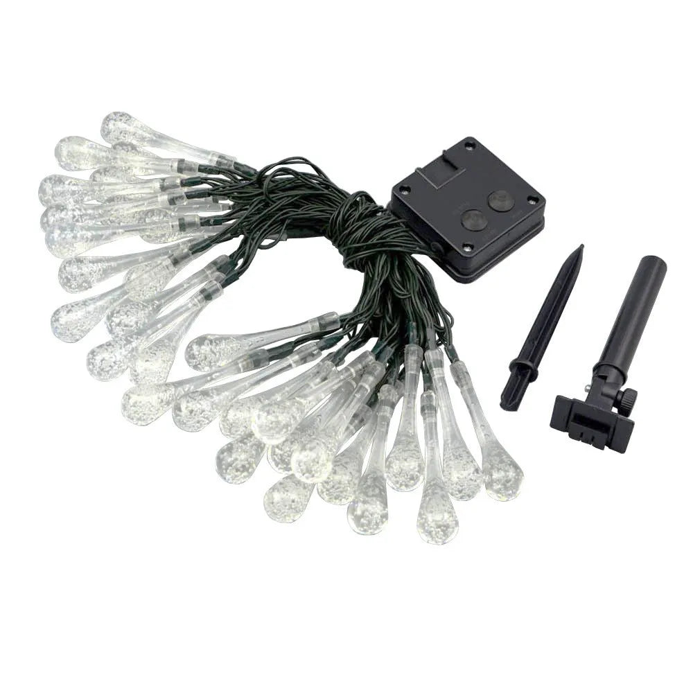 Solar-powered outdoor string lights with water drop shaped pendants on a 6.5 metre cable, shown with solar panel and ground spike.