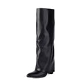 Women's plus size thick high heel ankle boots in black, showing sewing line detail on faux PU upper