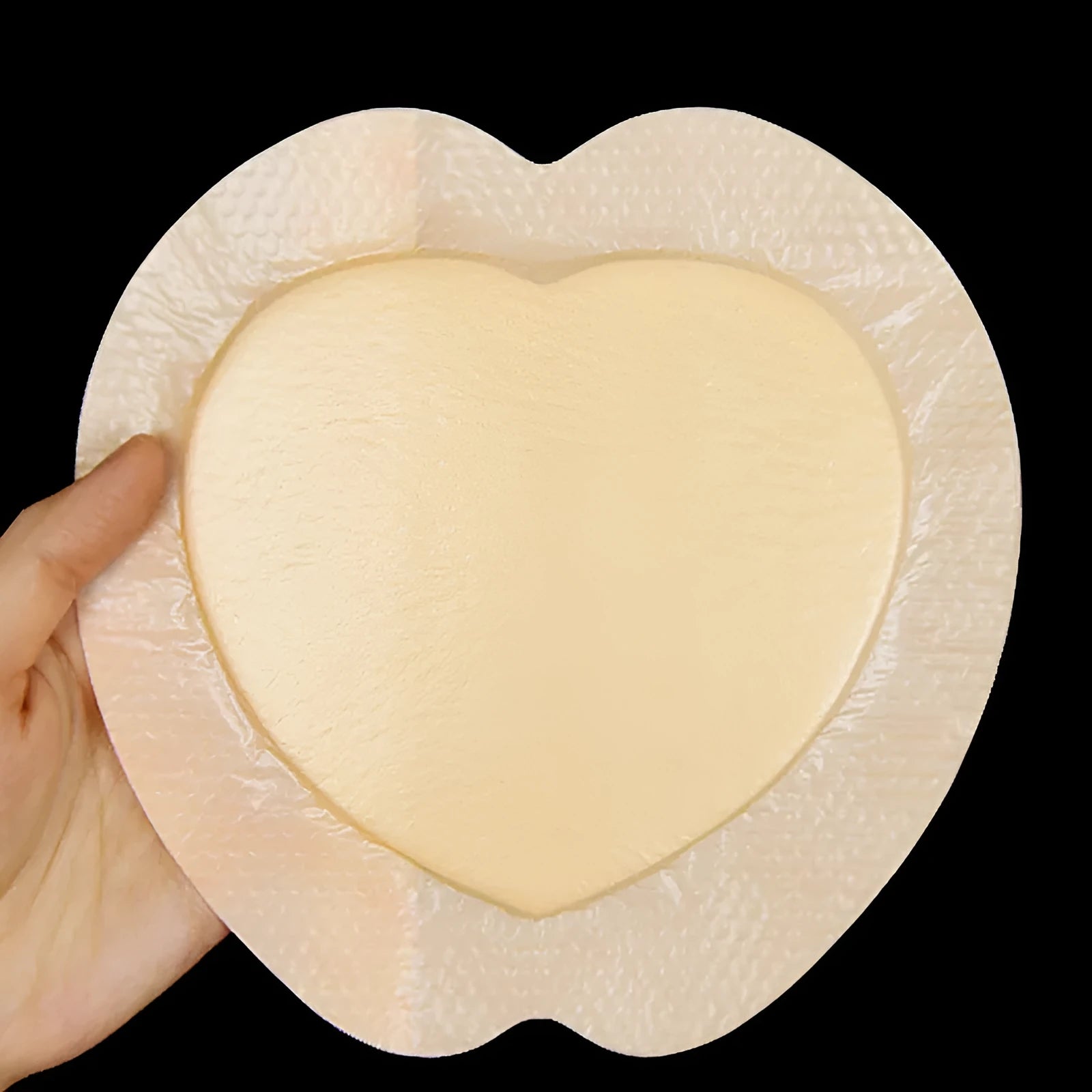 Large skin-tone silicone foam medical dressing for pressure relief and wound care