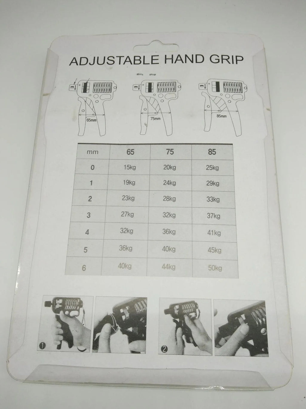 Black adjustable finger trainer grip strength exerciser with ABS and metal construction on a plain background