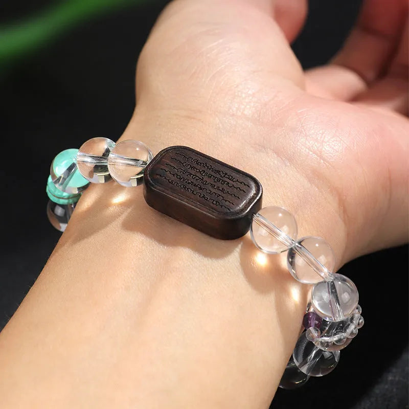 Natural white crystal ebony five warp handmade bracelet on neutral background