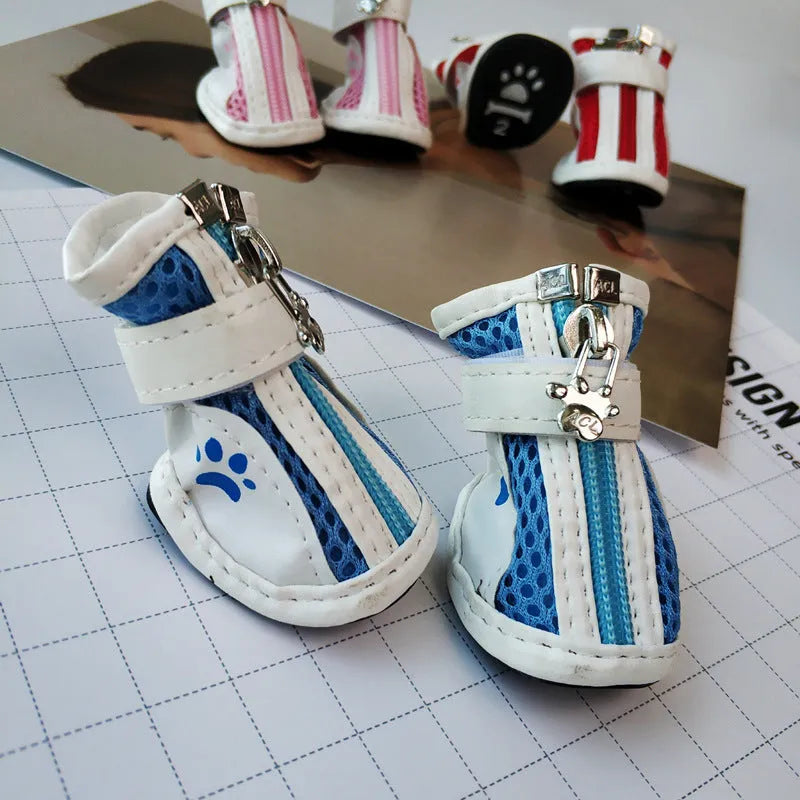 Blue dog shoes with zipper closures and non-slip rubber soles for pet paw protection