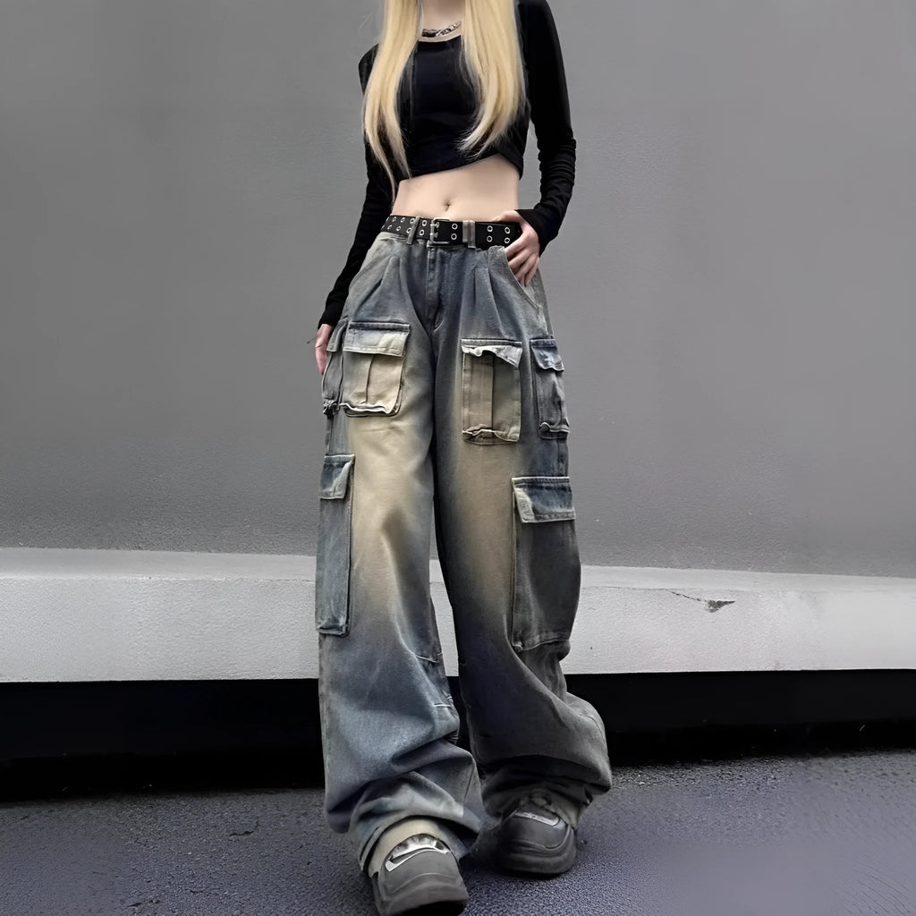 Loose fit distressed denim jeans with multiple pockets in light blue wash
