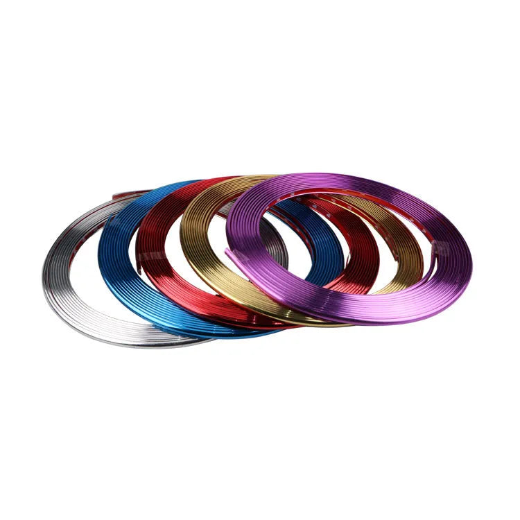 Roll of galvanised purple PVC wheel hub trim guard strip, 8 metres long.