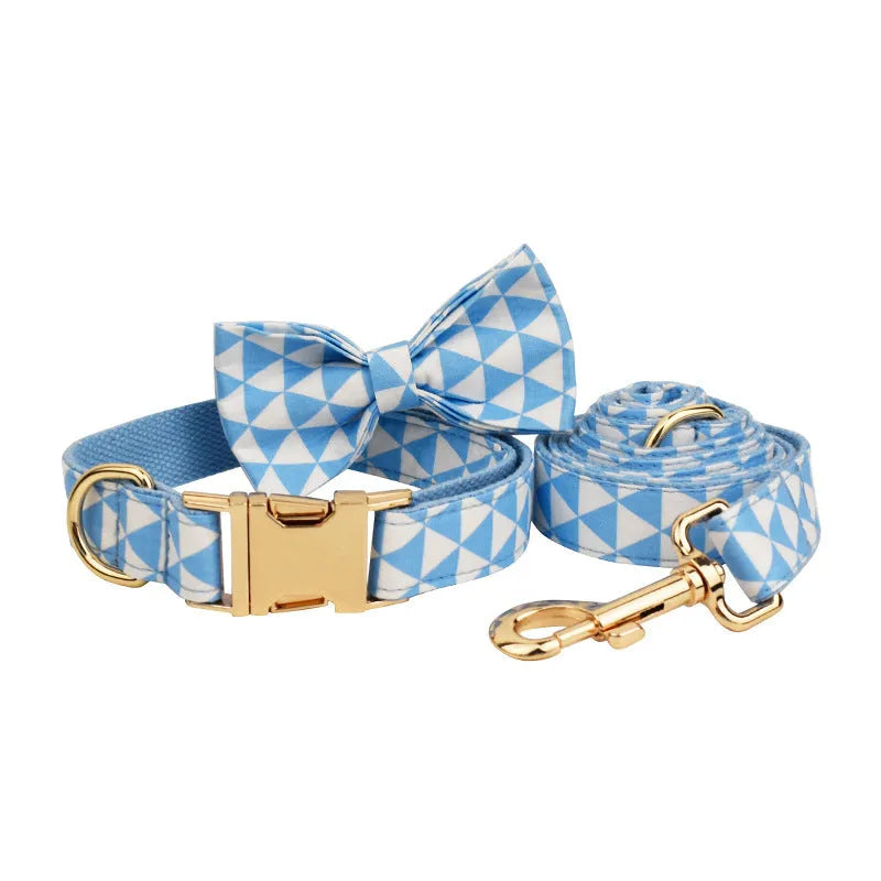 Blue triangular ring rope dog harness set with collar, lead, decorative bow and vest on cloth material