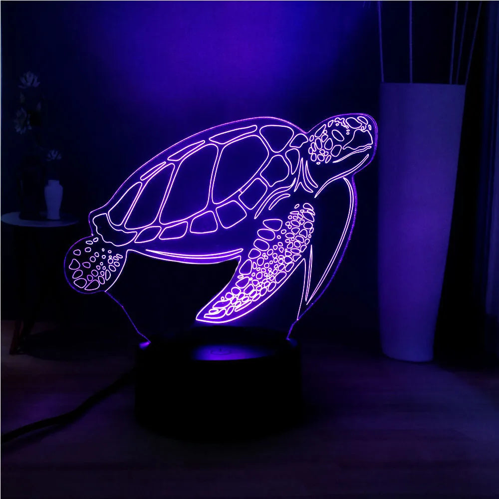3D acrylic turtle-shaped LED night light displaying one of its 16 colour options.