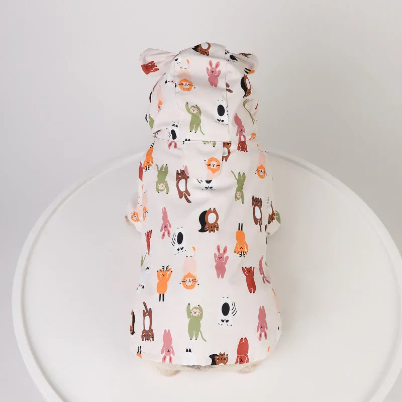 Beige cartoon print dog raincoat with double waterproof PU coating.