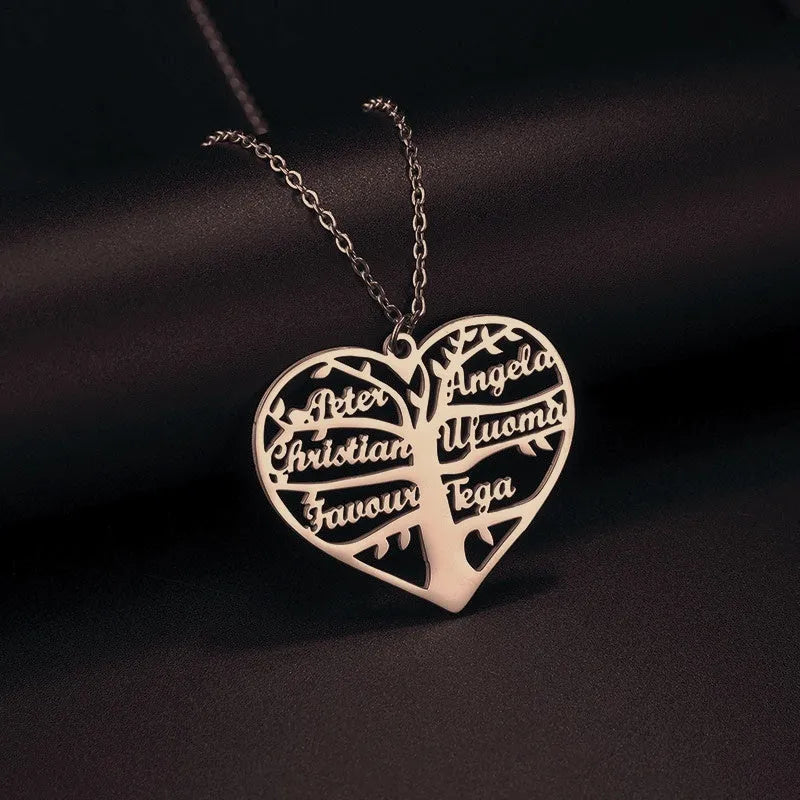 Personalised stainless steel necklace with hollow heart and lucky tree pendant showing custom name engraving
