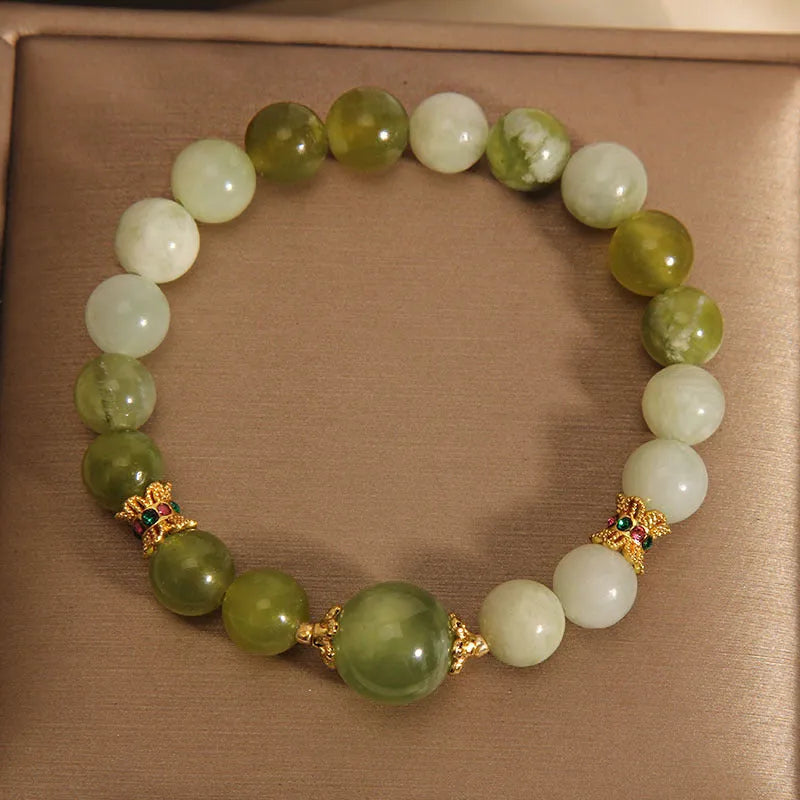 Xiuyan jade green women's bracelet in an original light luxury Mori style design.