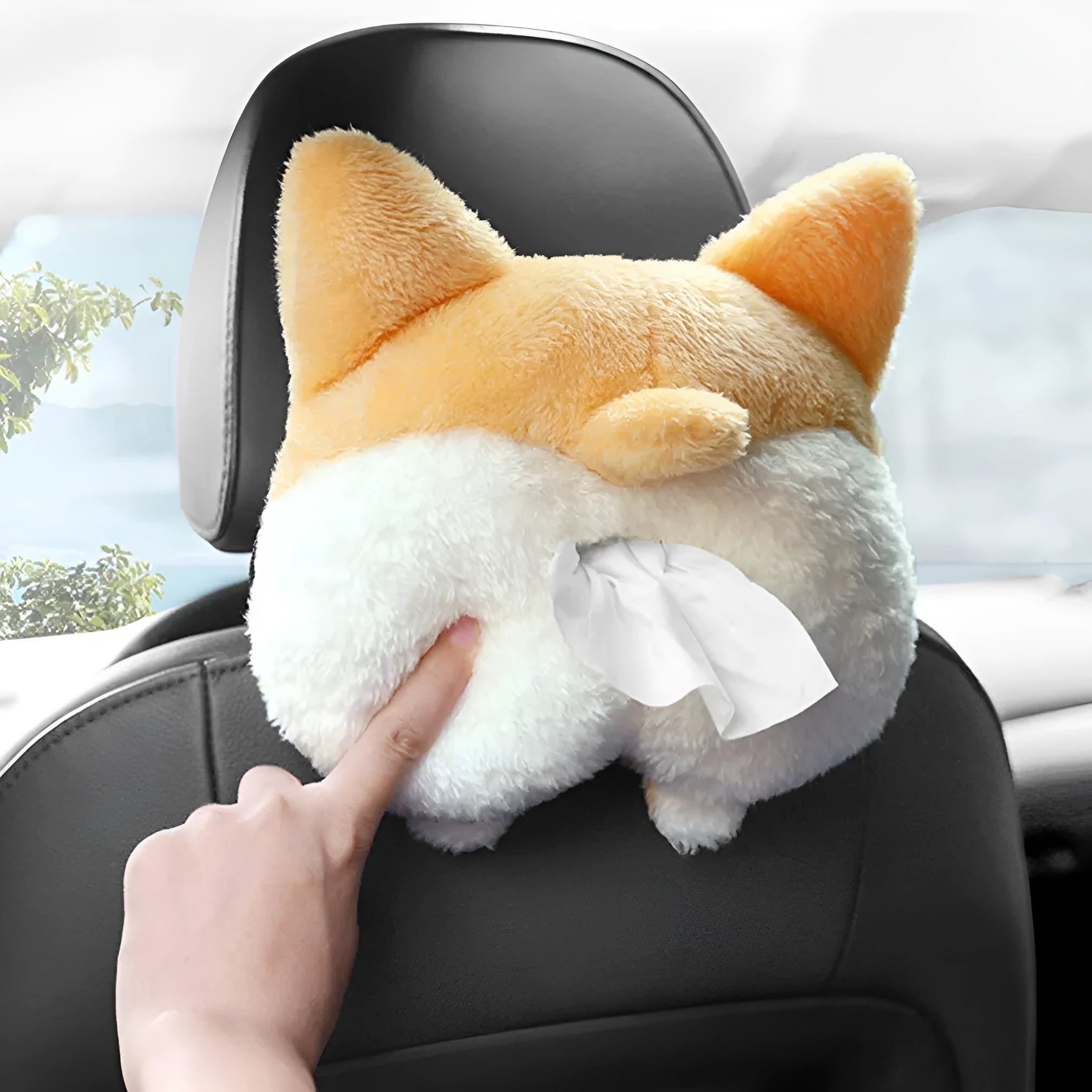 Yellow corgi butt-shaped car tissue box holder mounted on sun visor with elastic backing