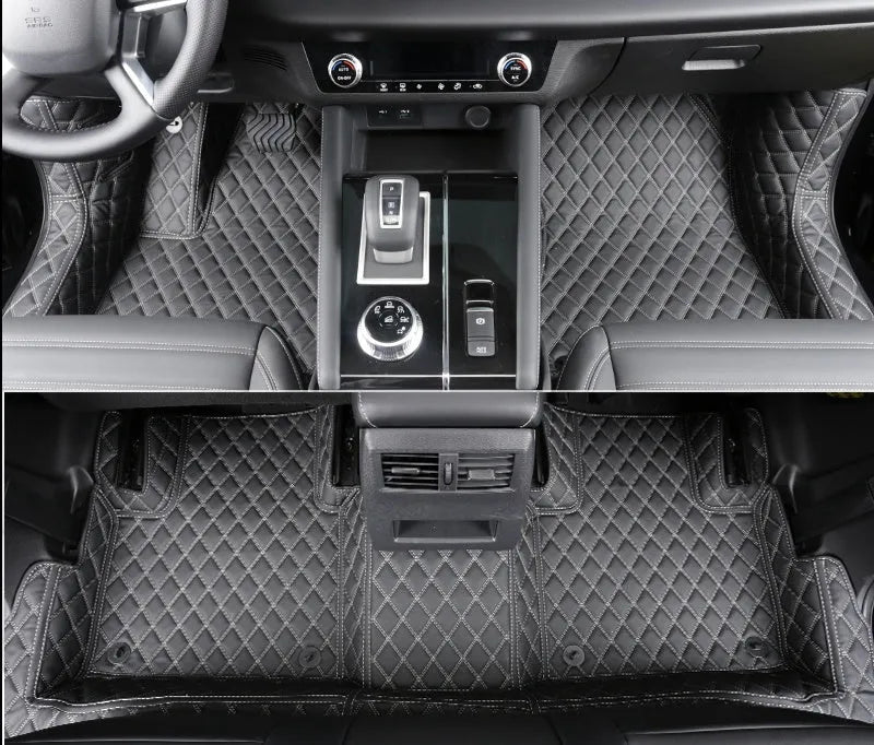 Custom black PU floor mats installed in a Mitsubishi Outlander footwell.
