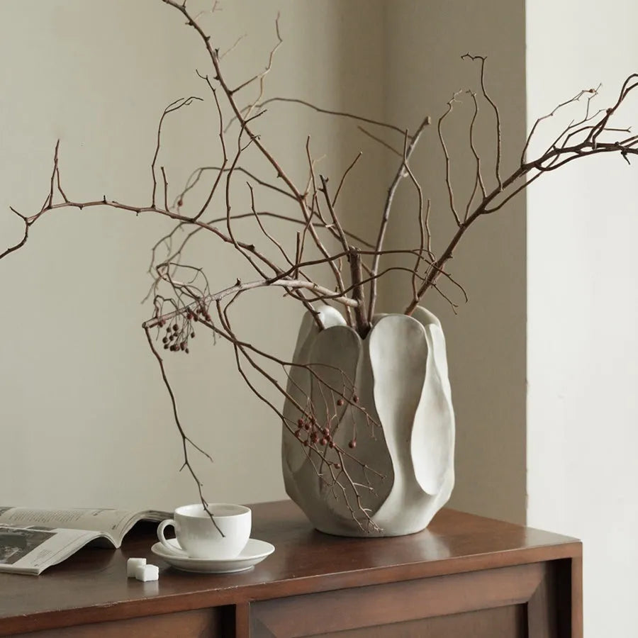 Irregular ceramic art vase in magnesium clay with artistic shape for home decoration