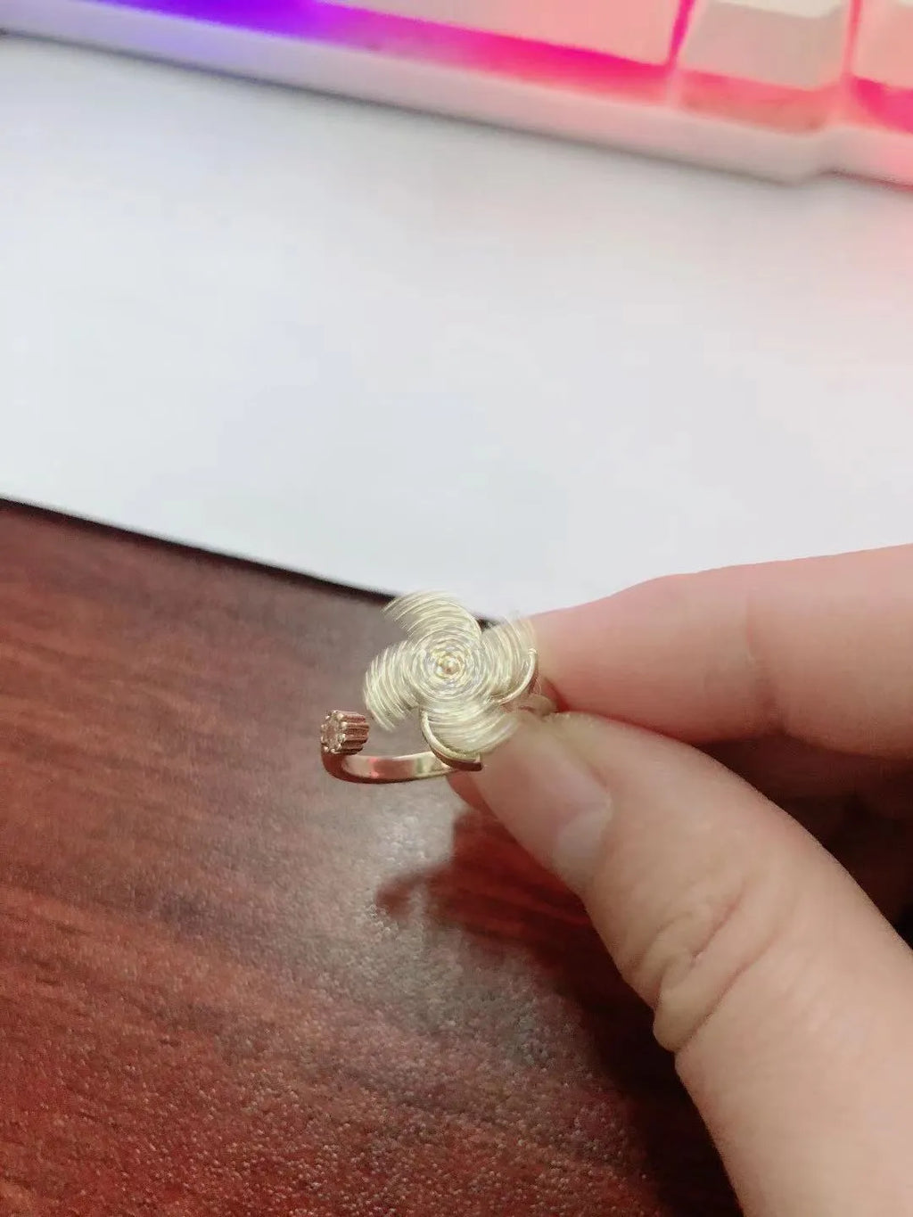 Copper rotating ring with spinning windmill design in gold or silver electroplated finish