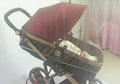 Baby stroller mosquito net full cover in black fine mesh on a pram for summer protection